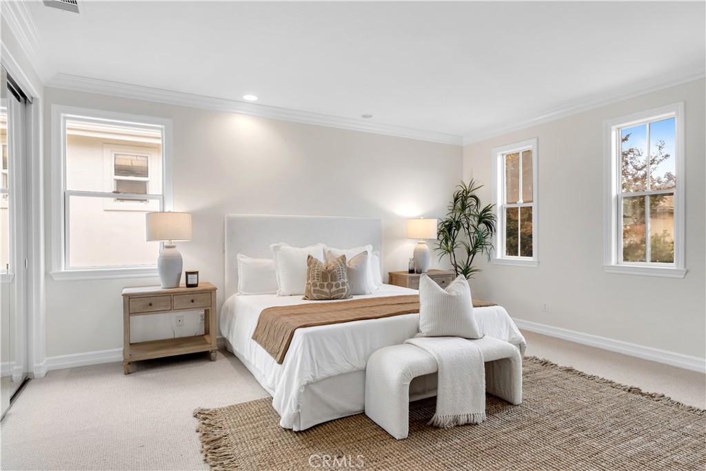 2105 Canyon Circle Costa Mesa, CA 92627 - Photo 22 of 35 a bedroom with bed and a window