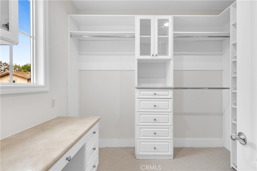 2105 Canyon Circle Costa Mesa, CA 92627 - Photo 26 of 35 a view of walk in closet with empty racks