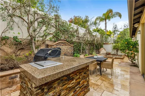 a view of a dinning table and chair in the patio