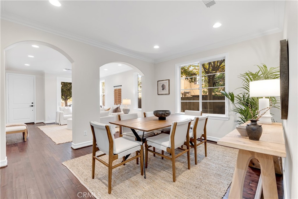 2105 Canyon Circle Costa Mesa, CA 92627 - Photo 9 of 35 a view of a dining room with furniture window and wooden floor
