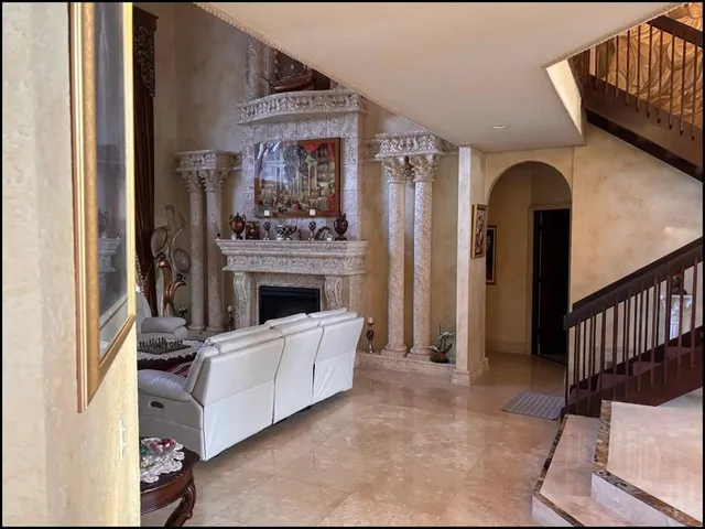 a kitchen with stainless steel appliances a stove and a sink