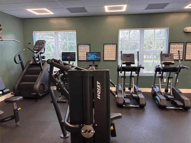 a spacious bathroom with a tub and window