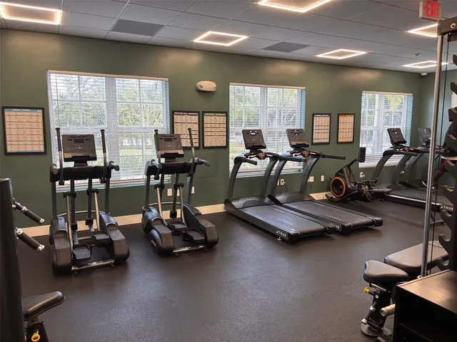 a spacious bathroom with a double vanity sink and a mirror