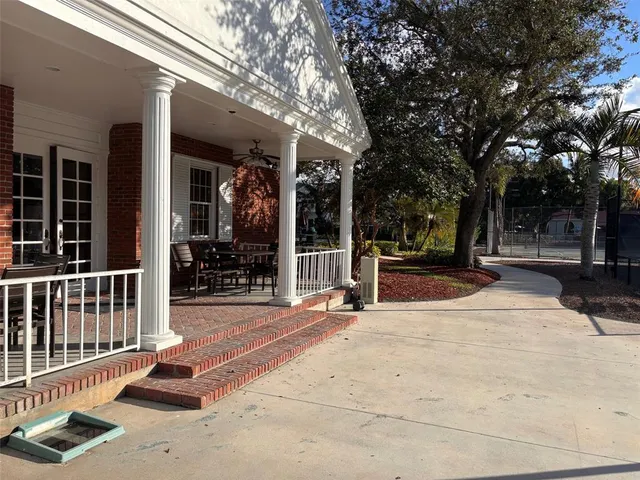 a kitchen with a refrigerator and a window