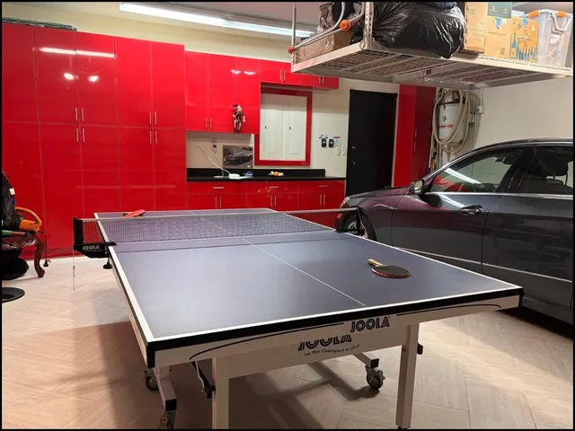 a dining room with furniture wooden floor and a potted plant