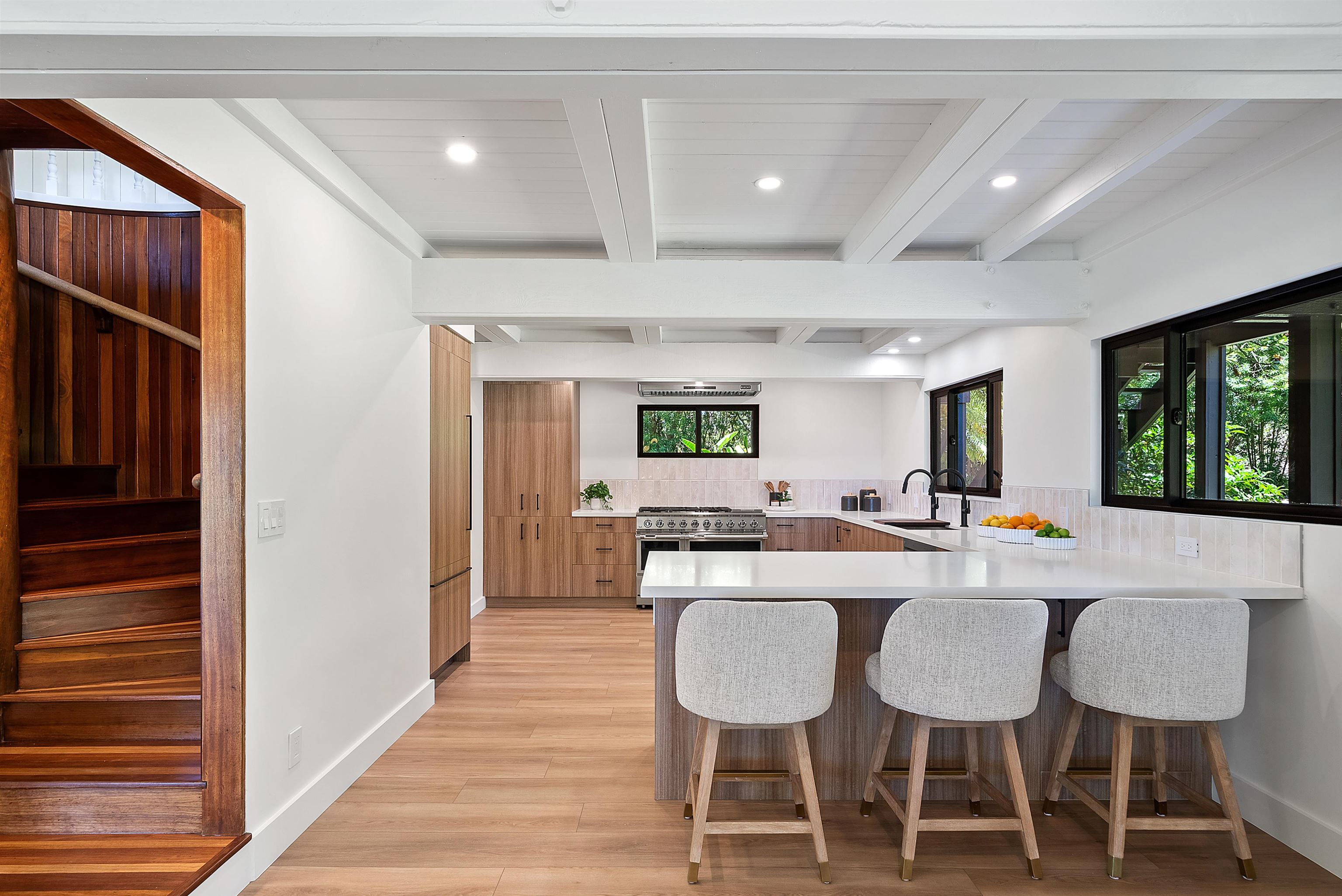 965 Hog Back Road Haiku, HI 96708 - Photo 2 of 35 a view of a dining room with furniture window and wooden floor