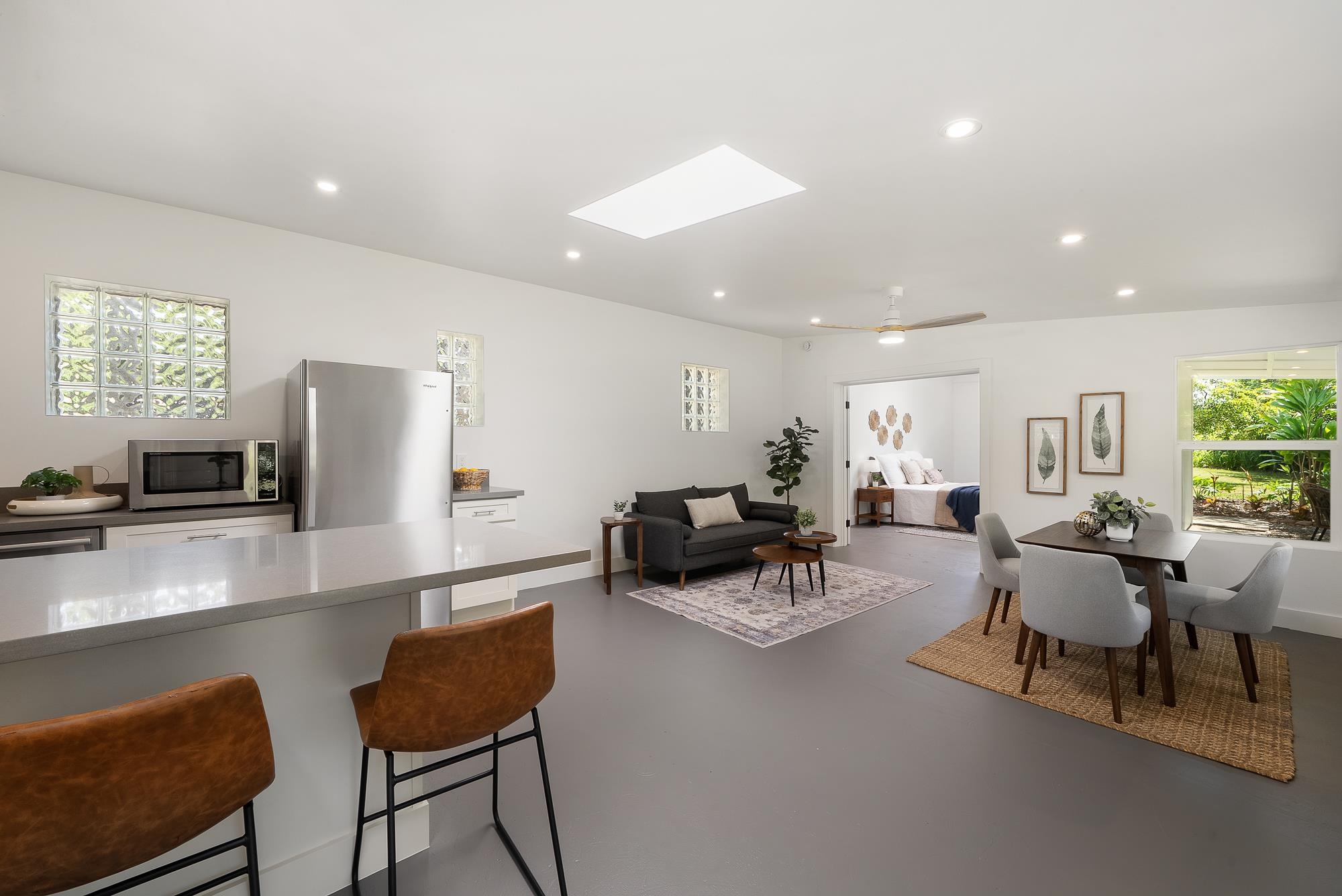 965 Hog Back Road Haiku, HI 96708 - Photo 29 of 35 a living room with furniture and a large window