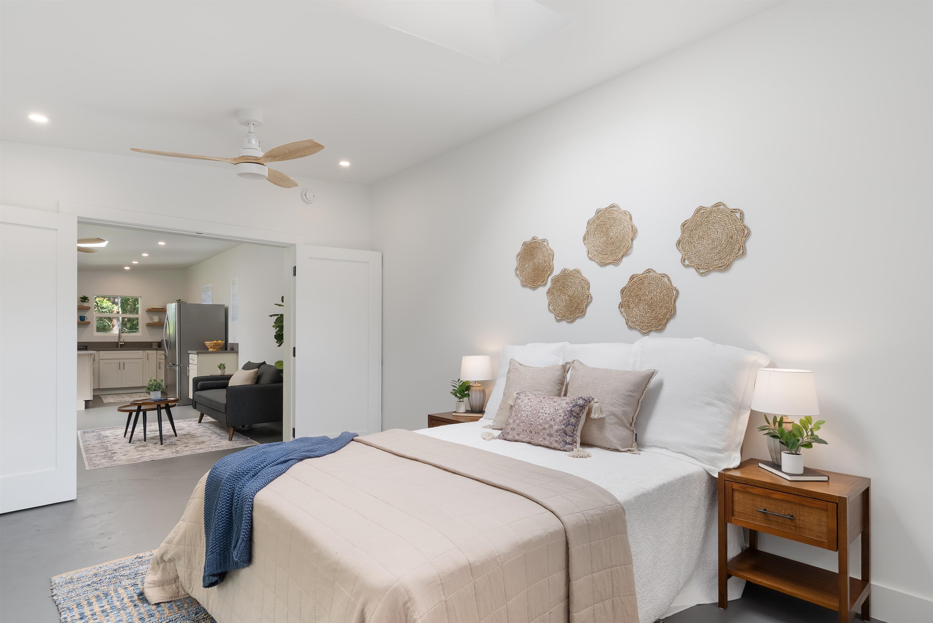 965 Hog Back Road Haiku, HI 96708 - Photo 30 of 35 a bedroom with a bed and a chair