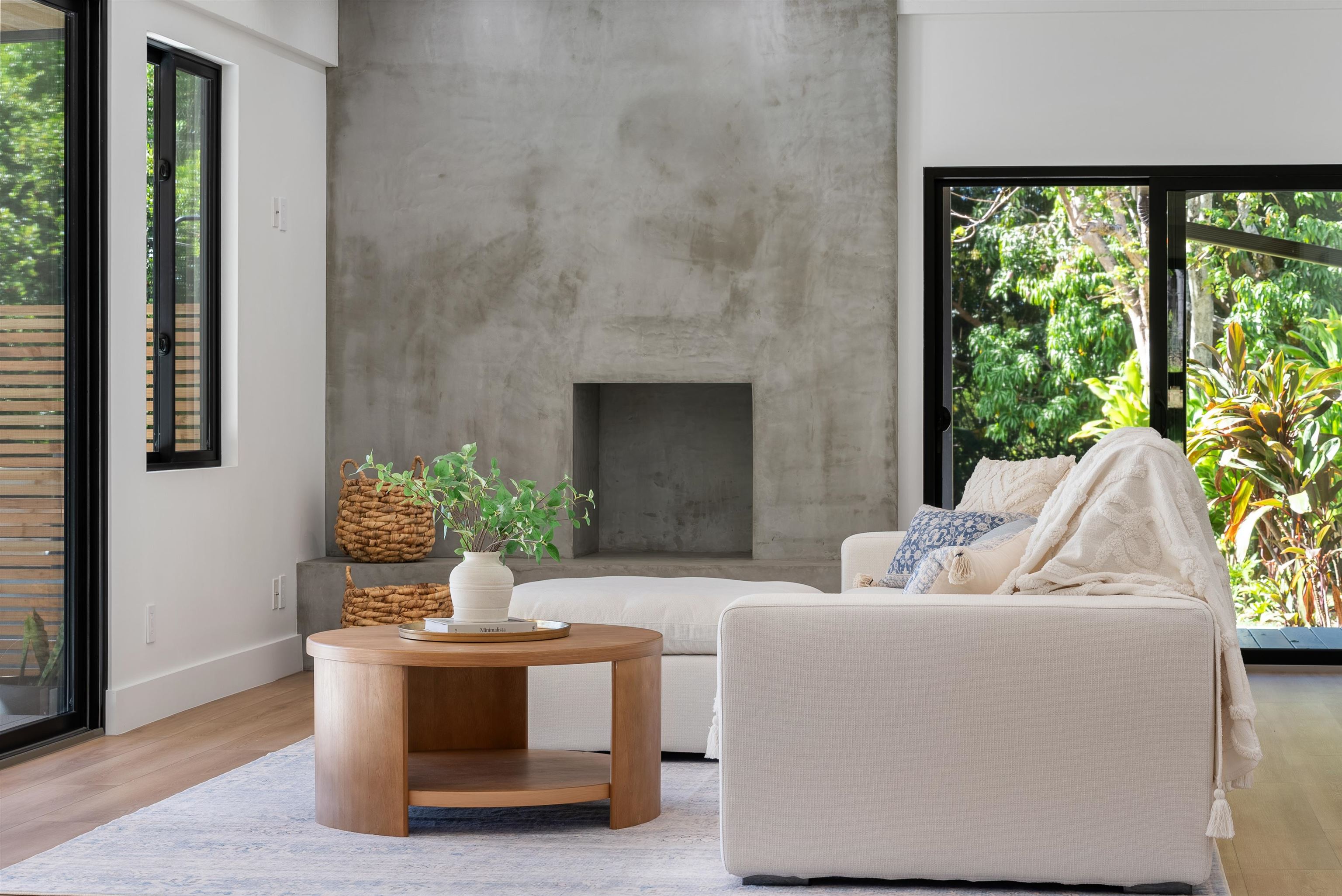 965 Hog Back Road Haiku, HI 96708 - Photo 3 of 35 a living room with furniture and a potted plant