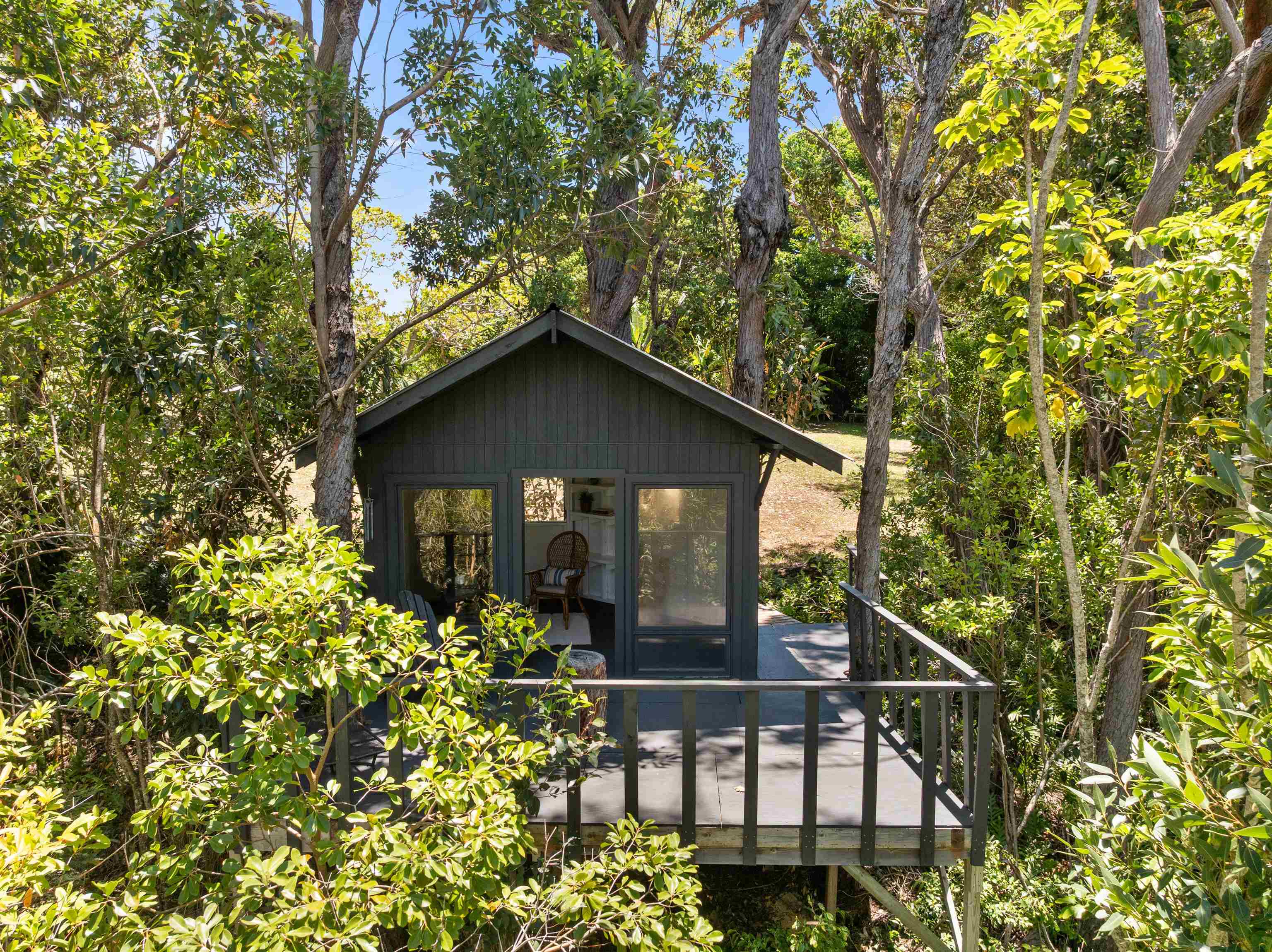 965 Hog Back Road Haiku, HI 96708 - Photo 33 of 35 a view of house with a outdoor space