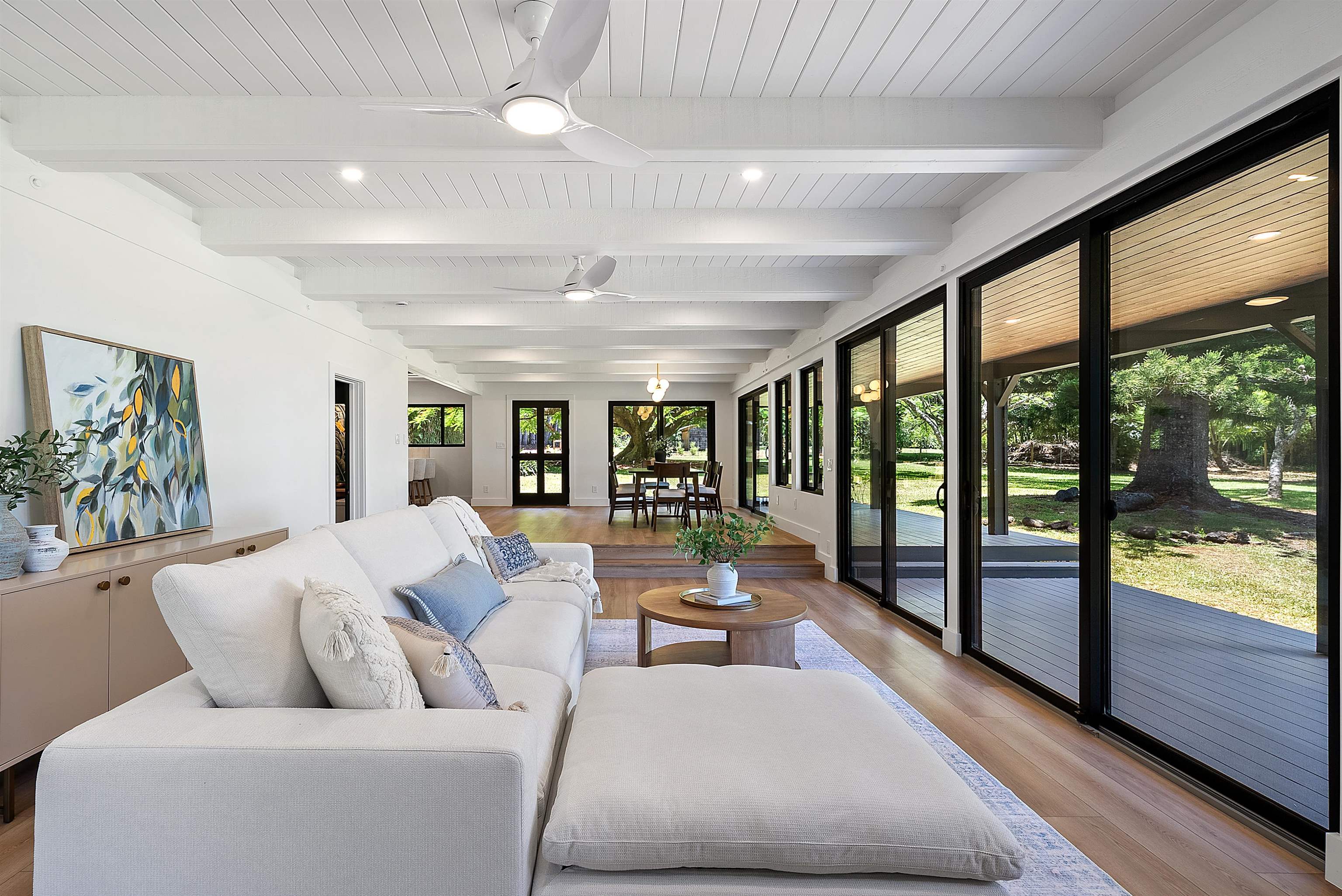 965 Hog Back Road Haiku, HI 96708 - Photo 6 of 35 a living room with furniture and a large window