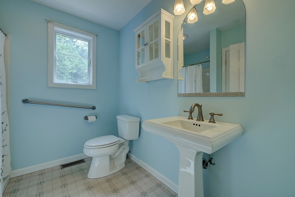 32 Bayberry Road Groton, MA 01450 - Photo 27 of 30 a bathroom with a sink toilet and mirror