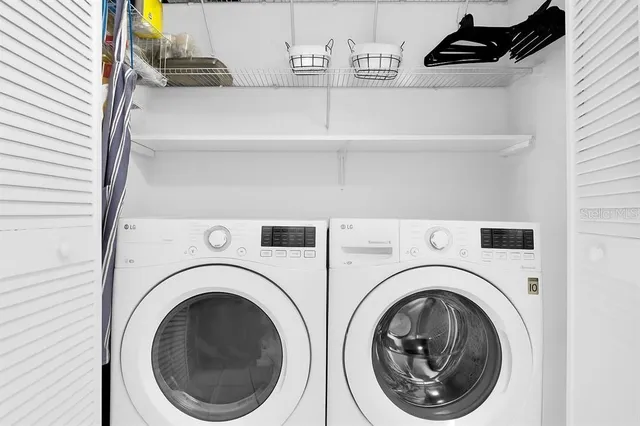 a utility room with dryer and washer