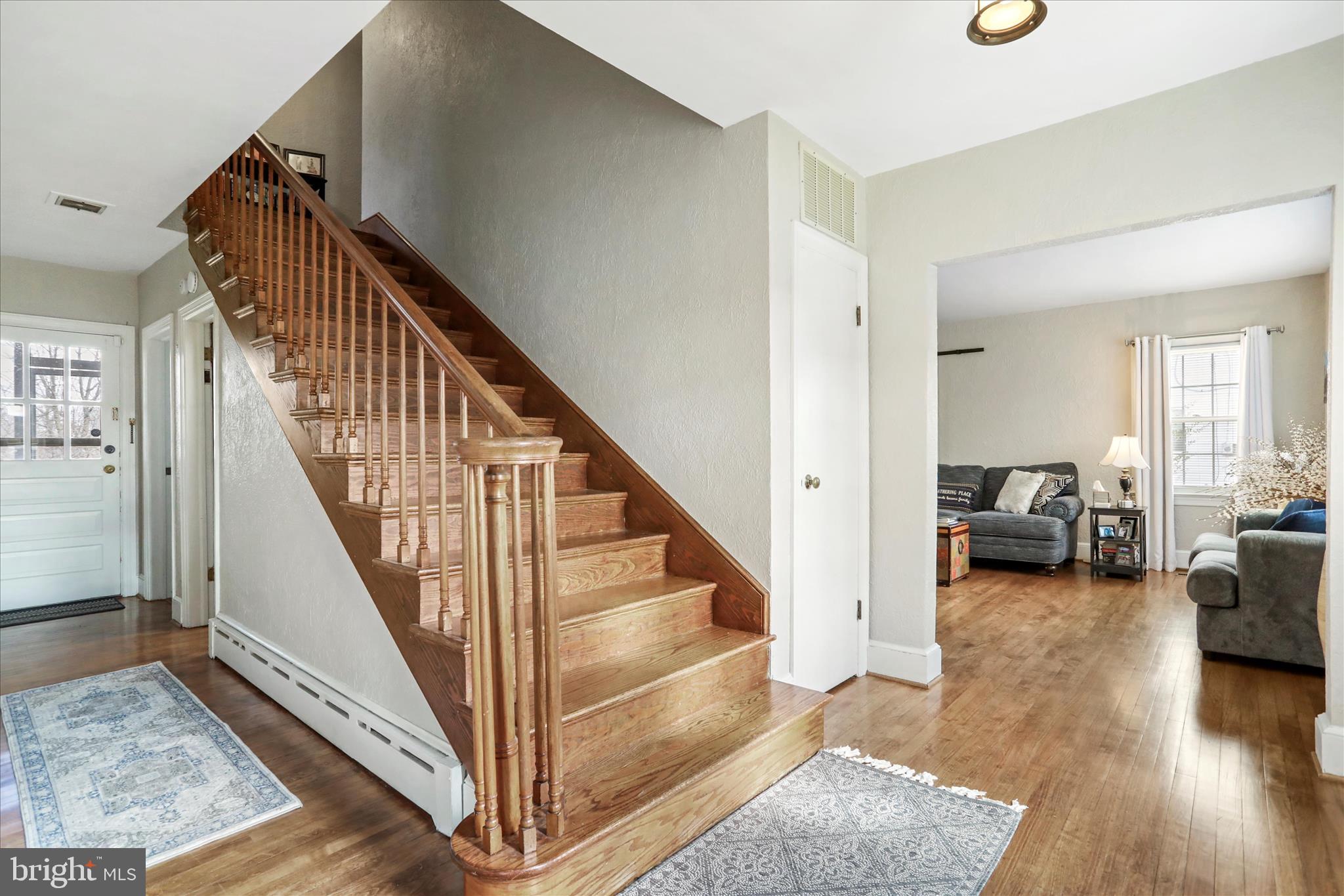 425 West 15th Street Front Royal, VA 22630 - Photo 5 of 47 a view of a livingroom with furniture stairs and a living room