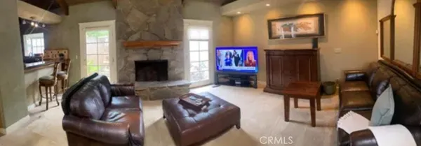 a kitchen with stainless steel appliances granite countertop a sink a stove and refrigerator