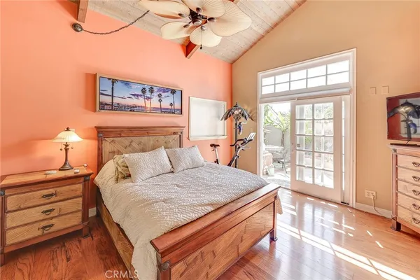 a bathroom with a granite countertop sink mirror and bathtub