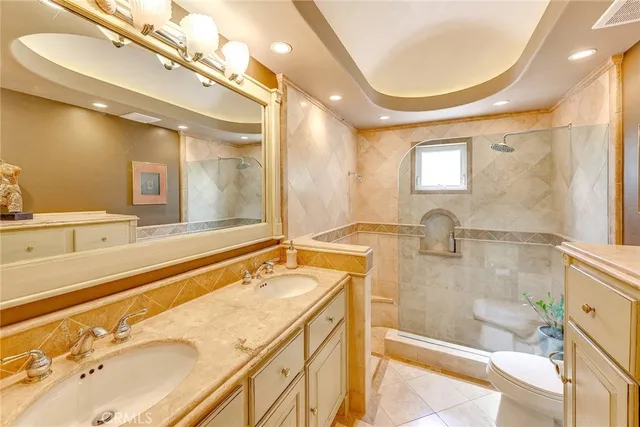 a view of a backyard with plants and a patio