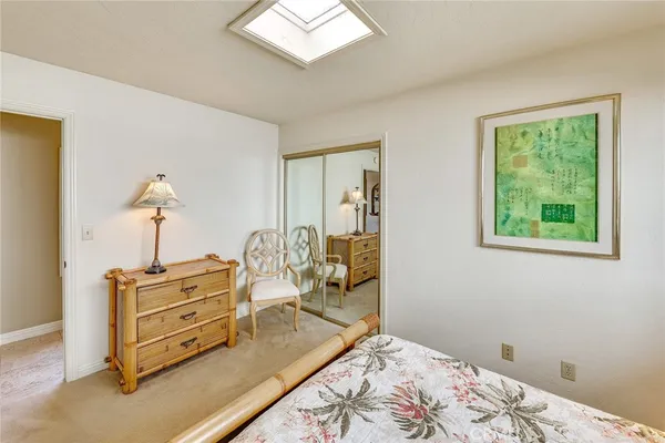 a picture of a yard with wooden fence