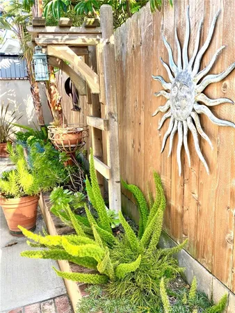 a view of a garden and swimming pool