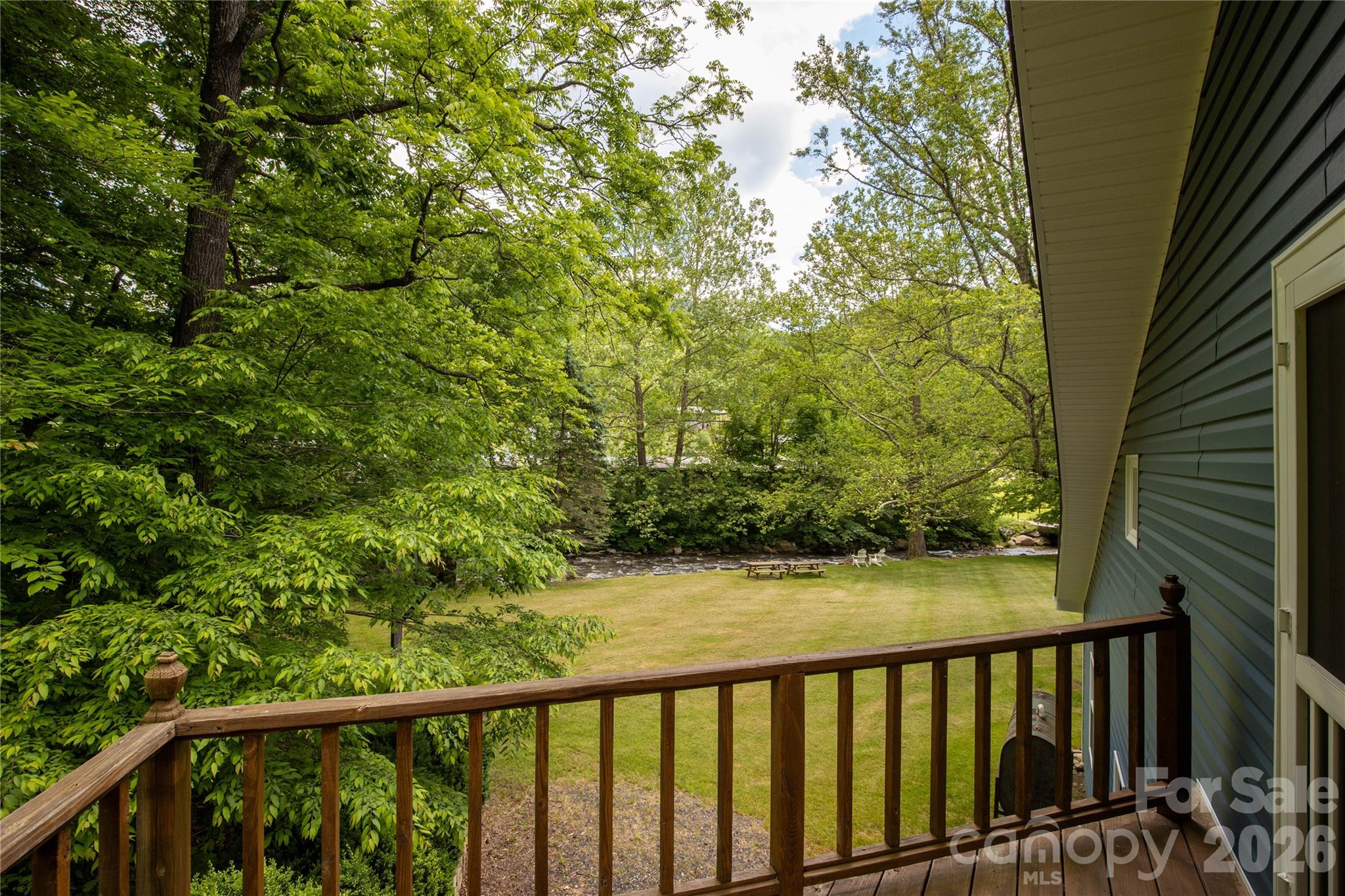 84 Sheets Farm Road Bakersville, NC 28705 - Photo 40 of 42 a view of a balcony with a pot