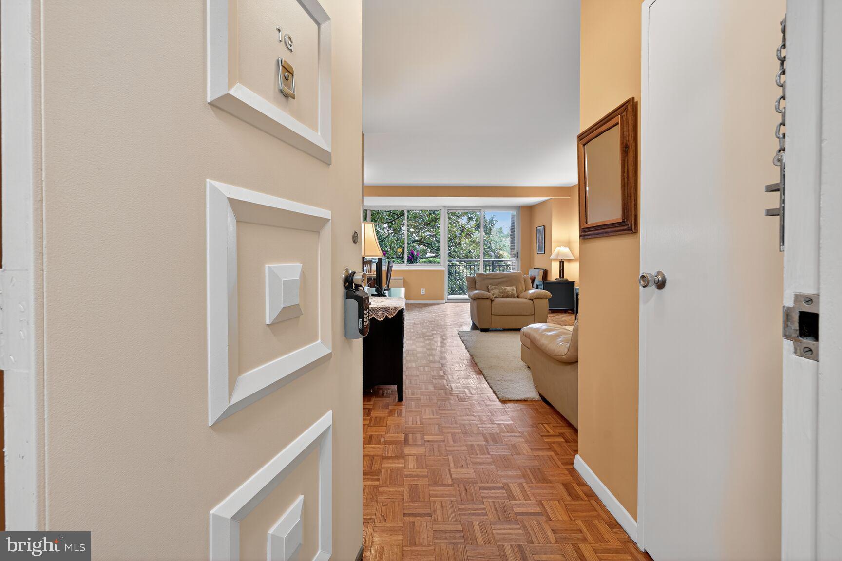 3900 Watson Place Northwest, Unit B1G Washington, DC 20016 - Photo 16 of 16 a view of a living room with a fireplace