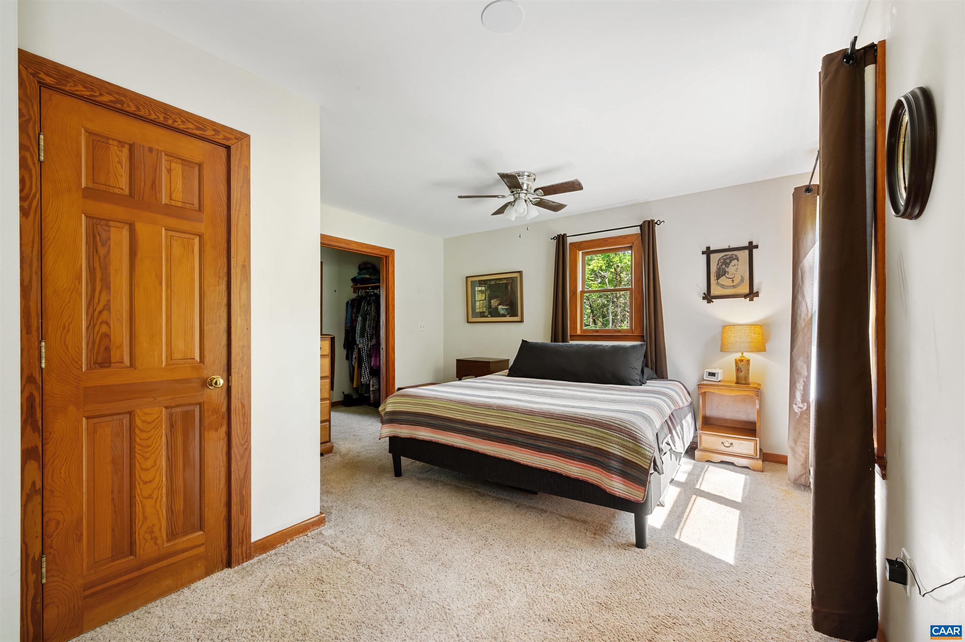 189 Edgehill Way Faber, VA 22938 - Photo 15 of 44 a bedroom with a bed and a window