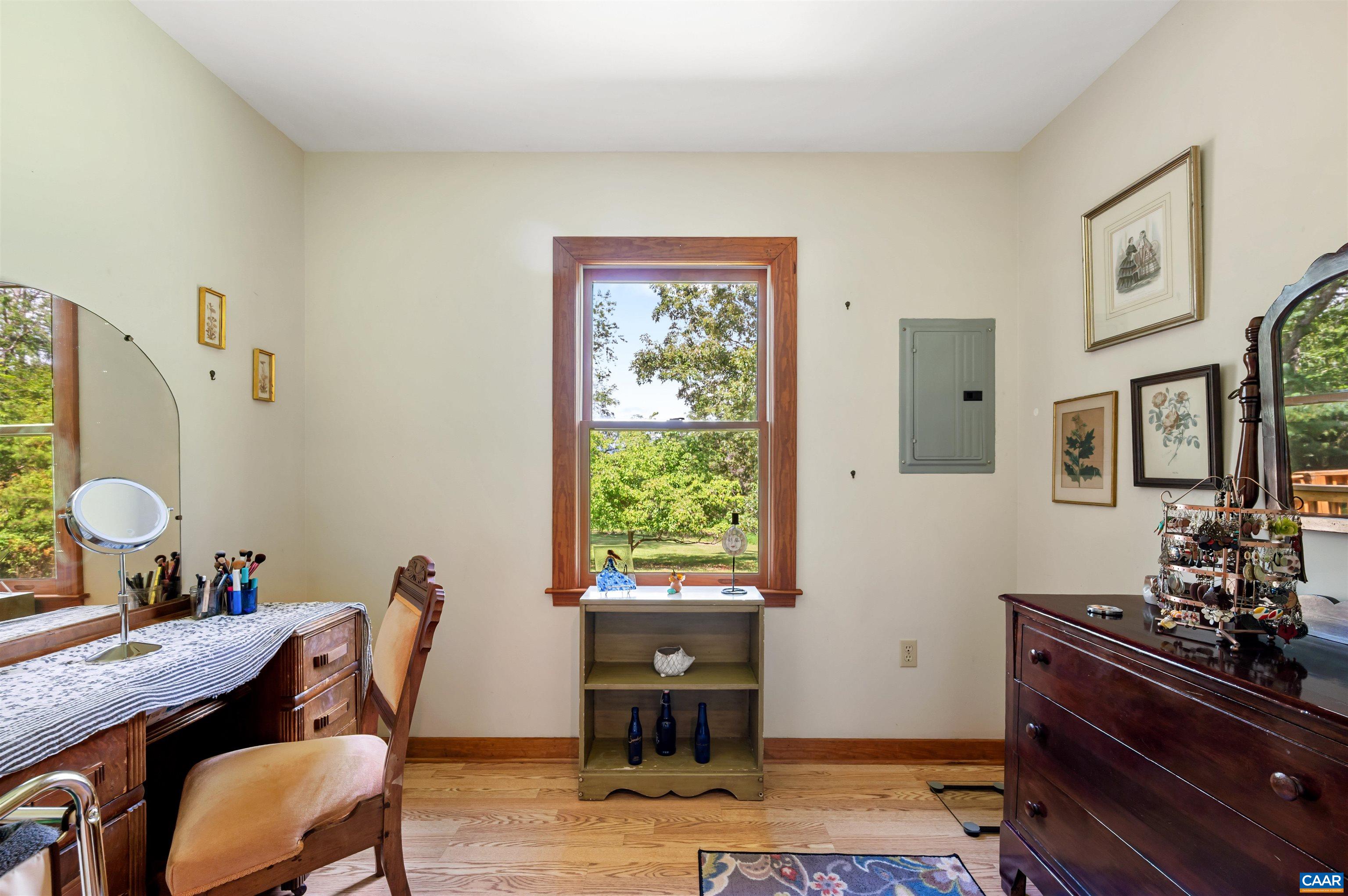 189 Edgehill Way Faber, VA 22938 - Photo 18 of 44 a view of a workspace with furniture and a window