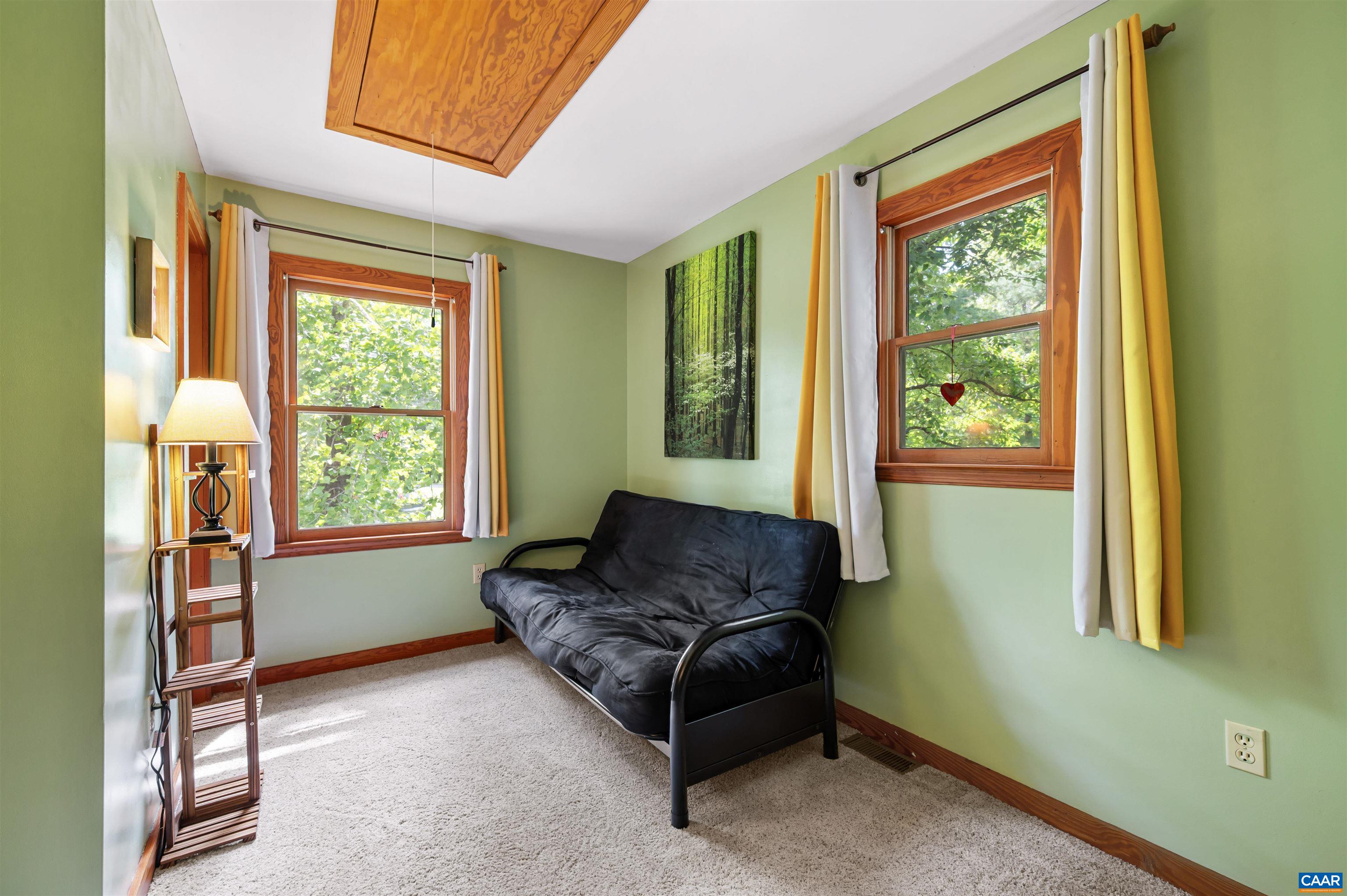 189 Edgehill Way Faber, VA 22938 - Photo 22 of 44 a living room with furniture and a window