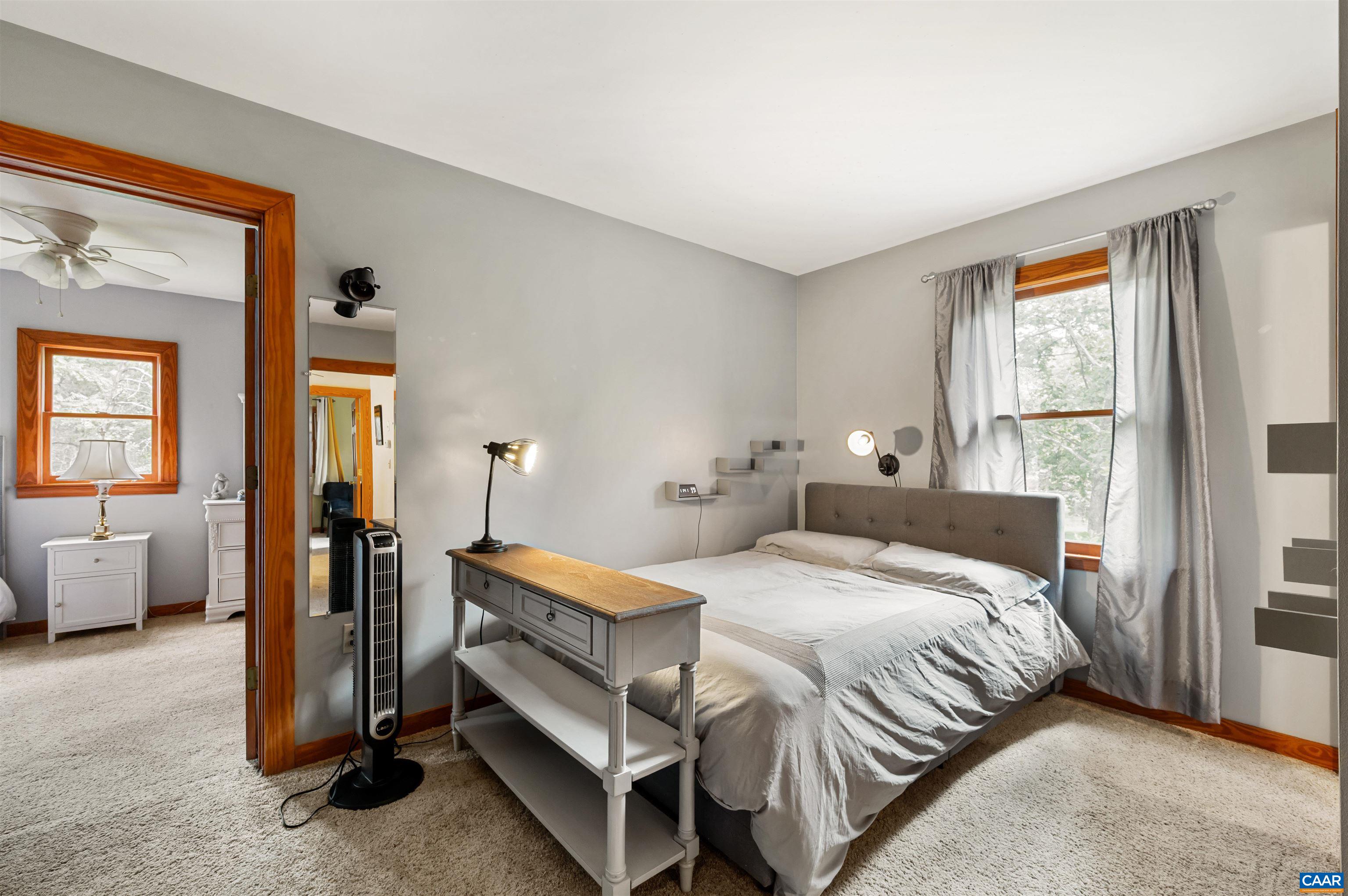 189 Edgehill Way Faber, VA 22938 - Photo 24 of 44 a bedroom with a bed and a couch