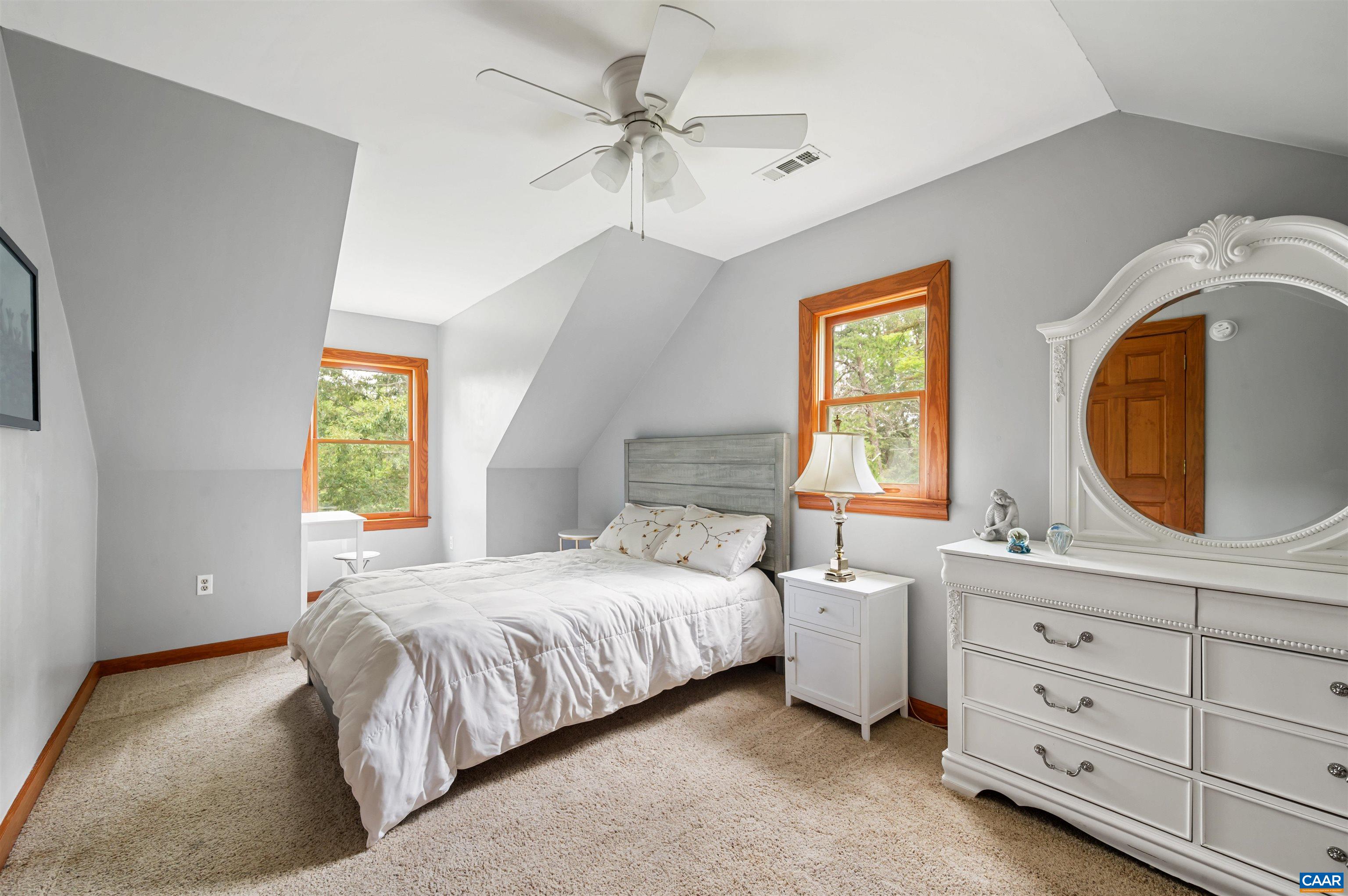 189 Edgehill Way Faber, VA 22938 - Photo 26 of 44 a bedroom with a bed and a dresser