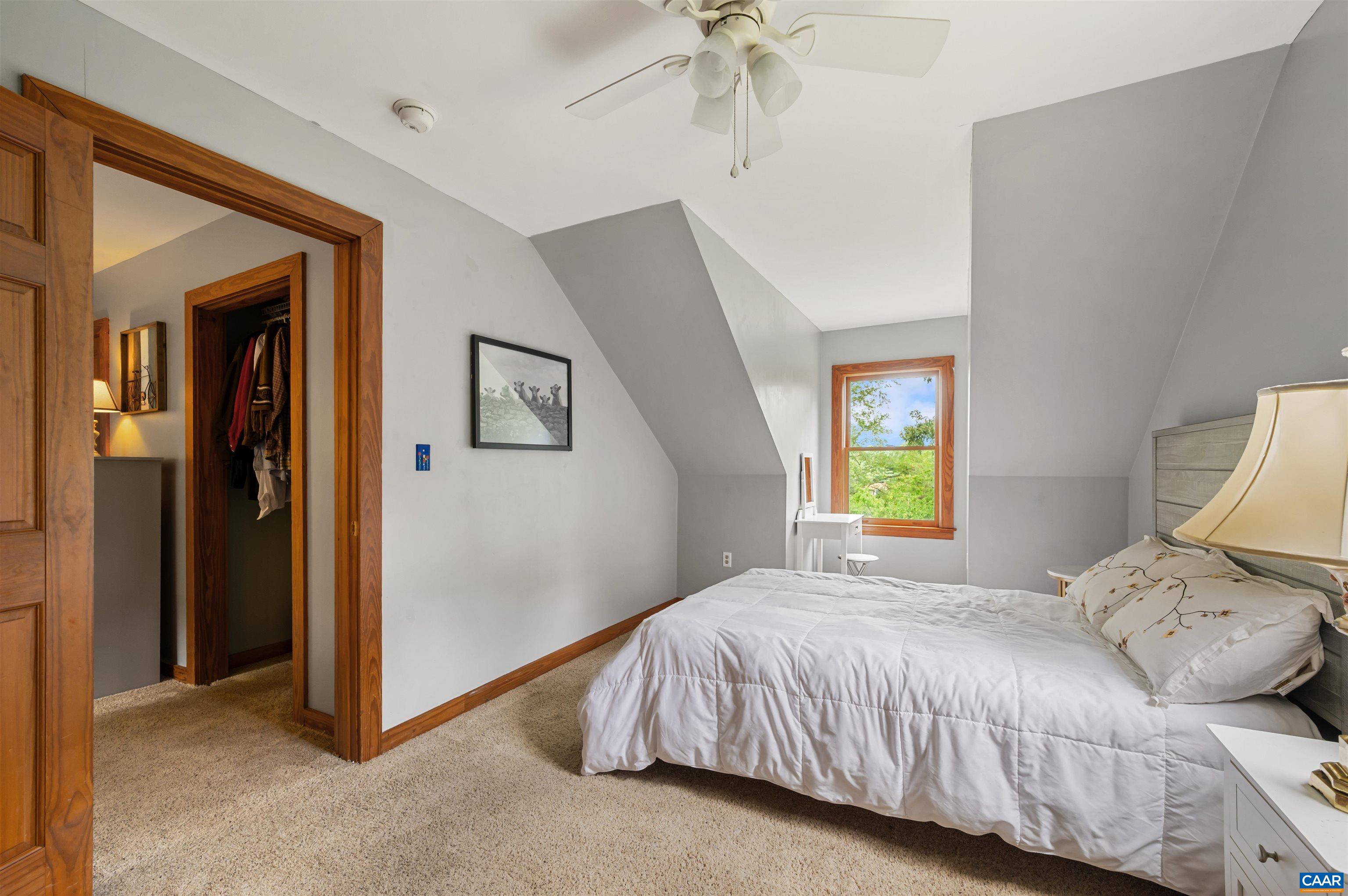 189 Edgehill Way Faber, VA 22938 - Photo 27 of 44 a bedroom with a bed and a window