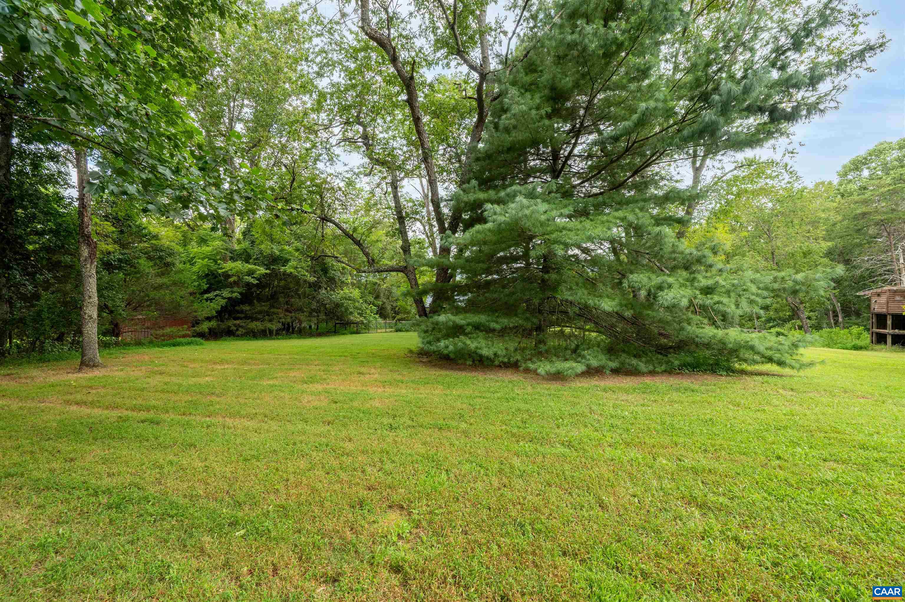 189 Edgehill Way Faber, VA 22938 - Photo 34 of 44 a view of a field with trees in the background
