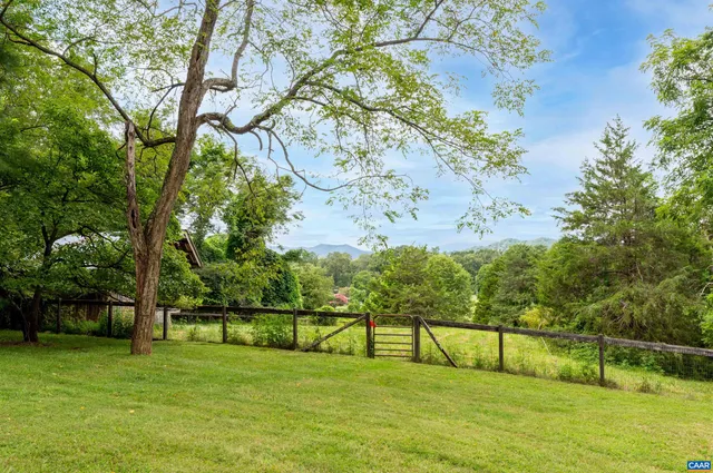 a view of swimming pool with a garden