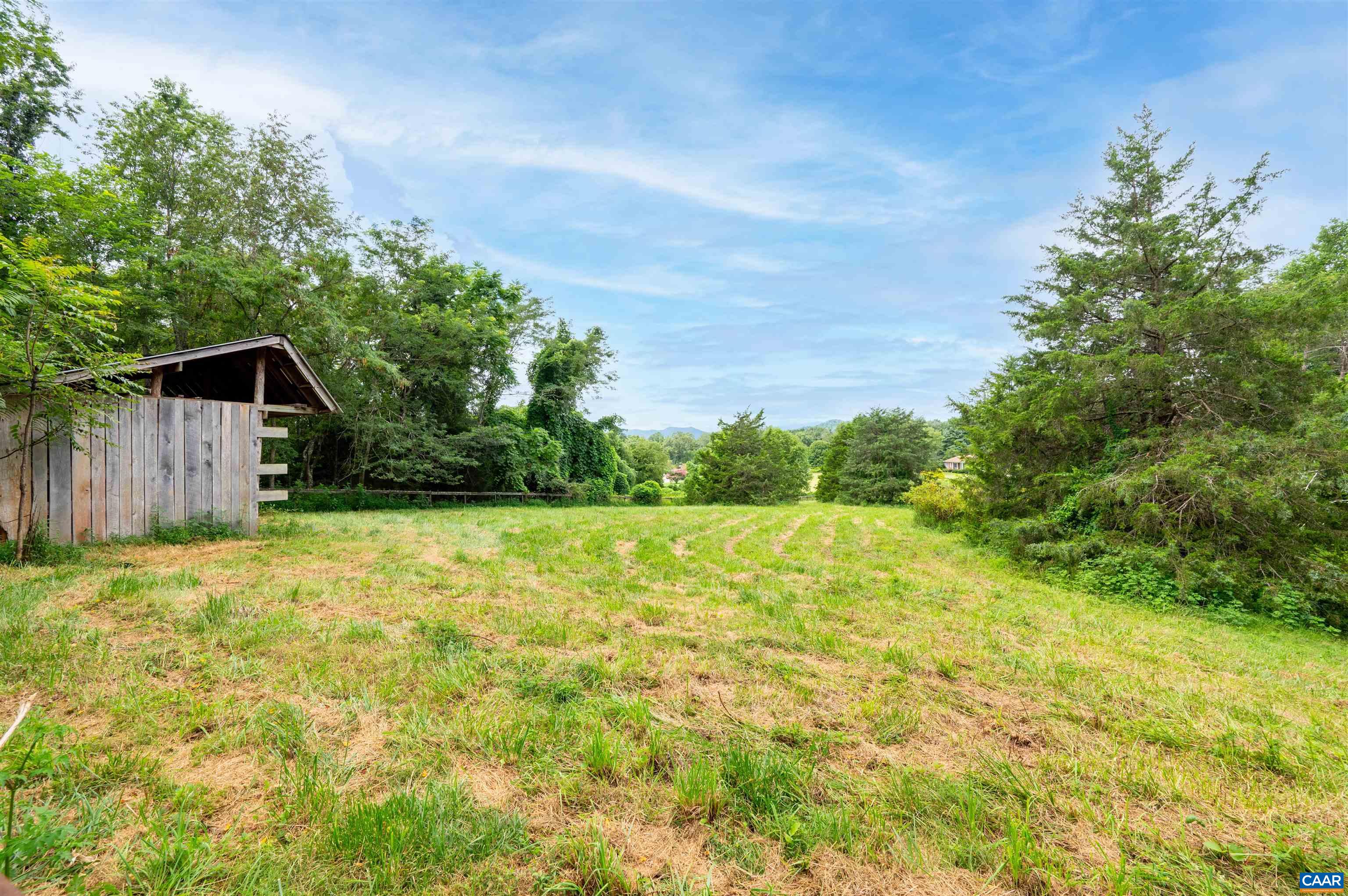 189 Edgehill Way Faber, VA 22938 - Photo 36 of 44 a backyard of a house with lots of green space