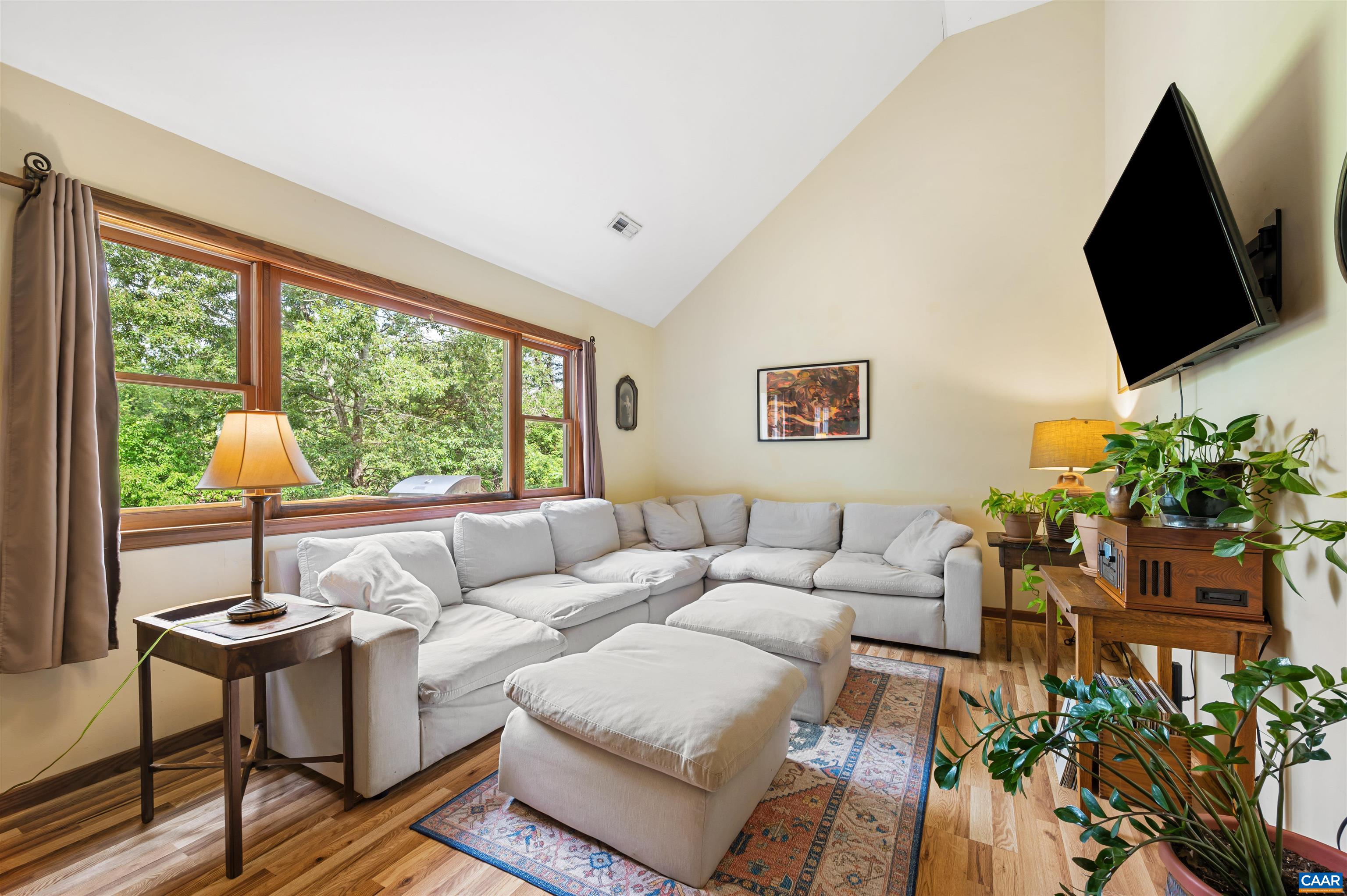 189 Edgehill Way Faber, VA 22938 - Photo 4 of 44 a living room with furniture and a flat screen tv