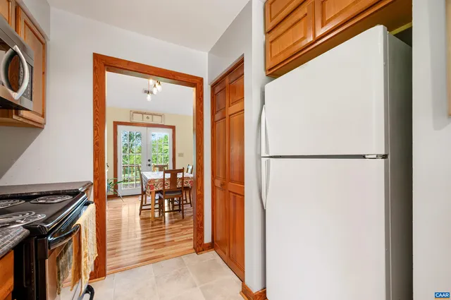 a view of a living room and dining room