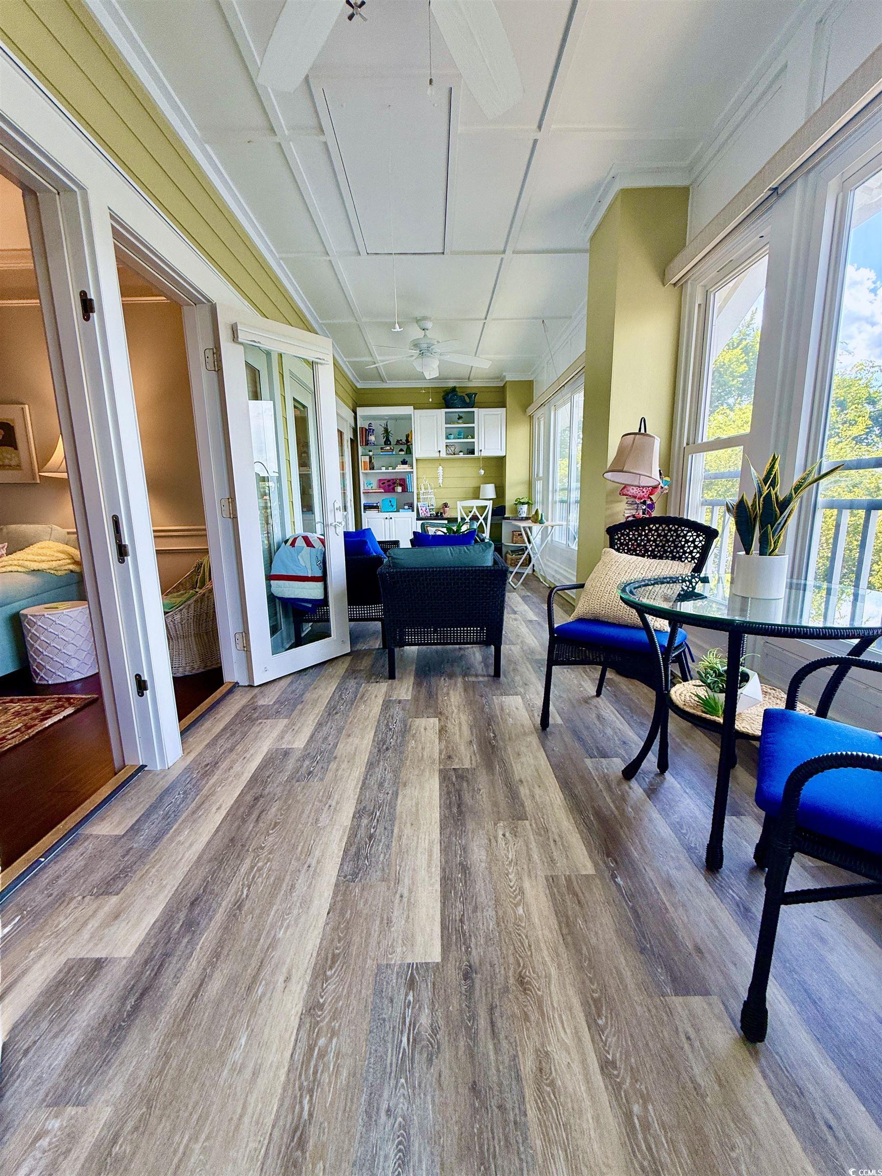 1330 Villa Marbella Court, Unit 303 Myrtle Beach, SC 29572 - Photo 14 of 40 Sunroom with coffered ceiling