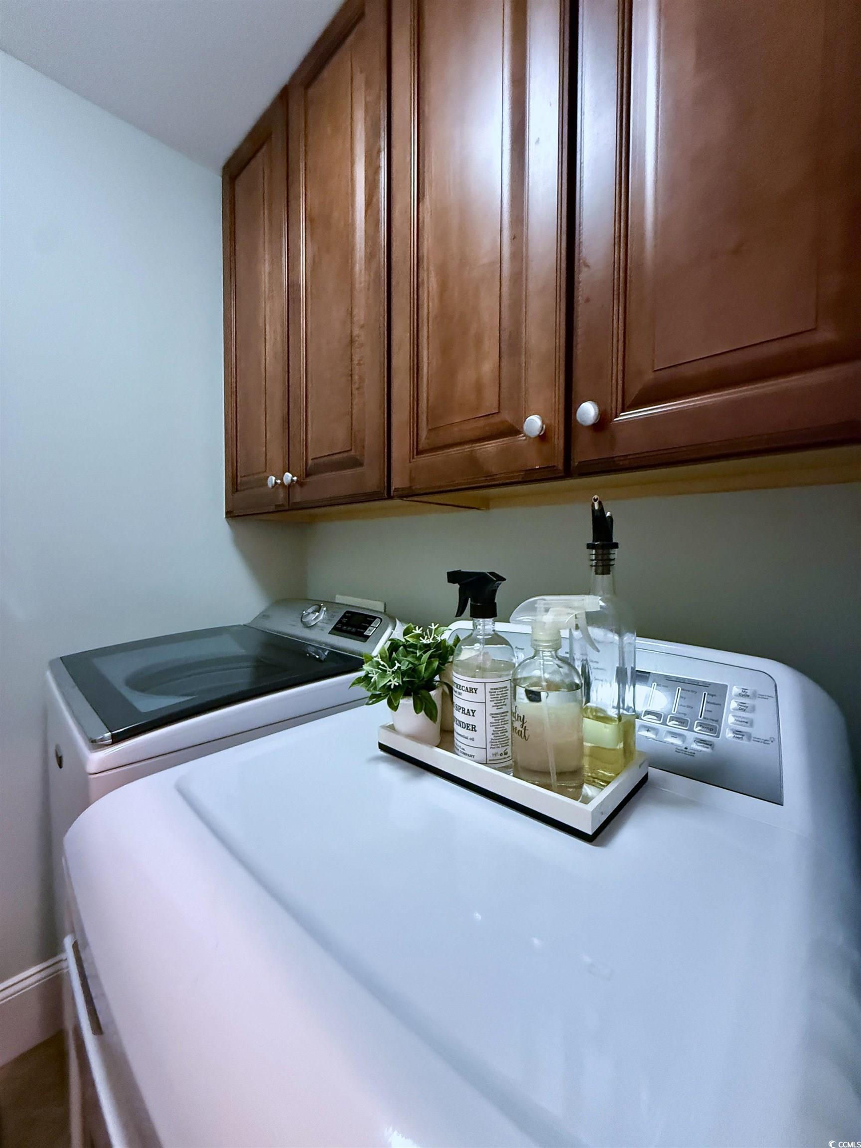 1330 Villa Marbella Court, Unit 303 Myrtle Beach, SC 29572 - Photo 29 of 40 Washroom with independent washer and dryer and cabinet space