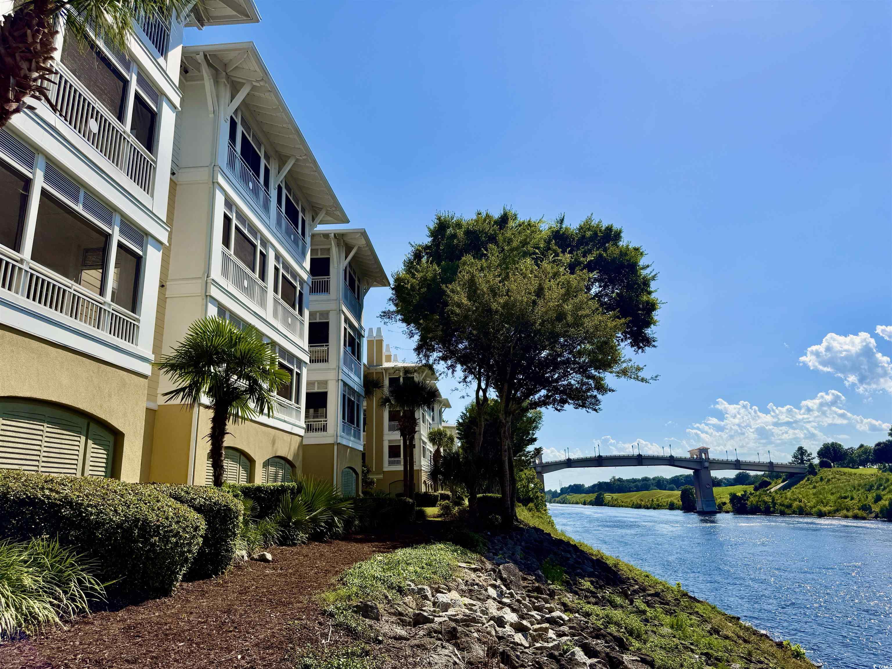 1330 Villa Marbella Court, Unit 303 Myrtle Beach, SC 29572 - Photo 35 of 40 Water view featuring a notable bridge
