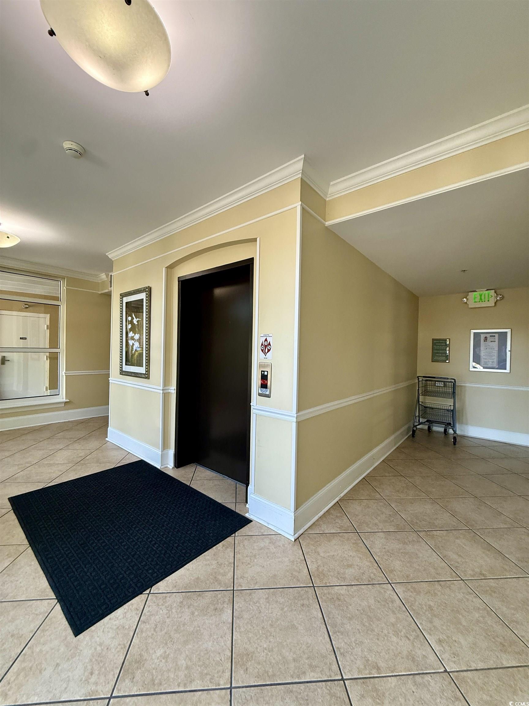 1330 Villa Marbella Court, Unit 303 Myrtle Beach, SC 29572 - Photo 37 of 40 View of exterior entry with elevator
