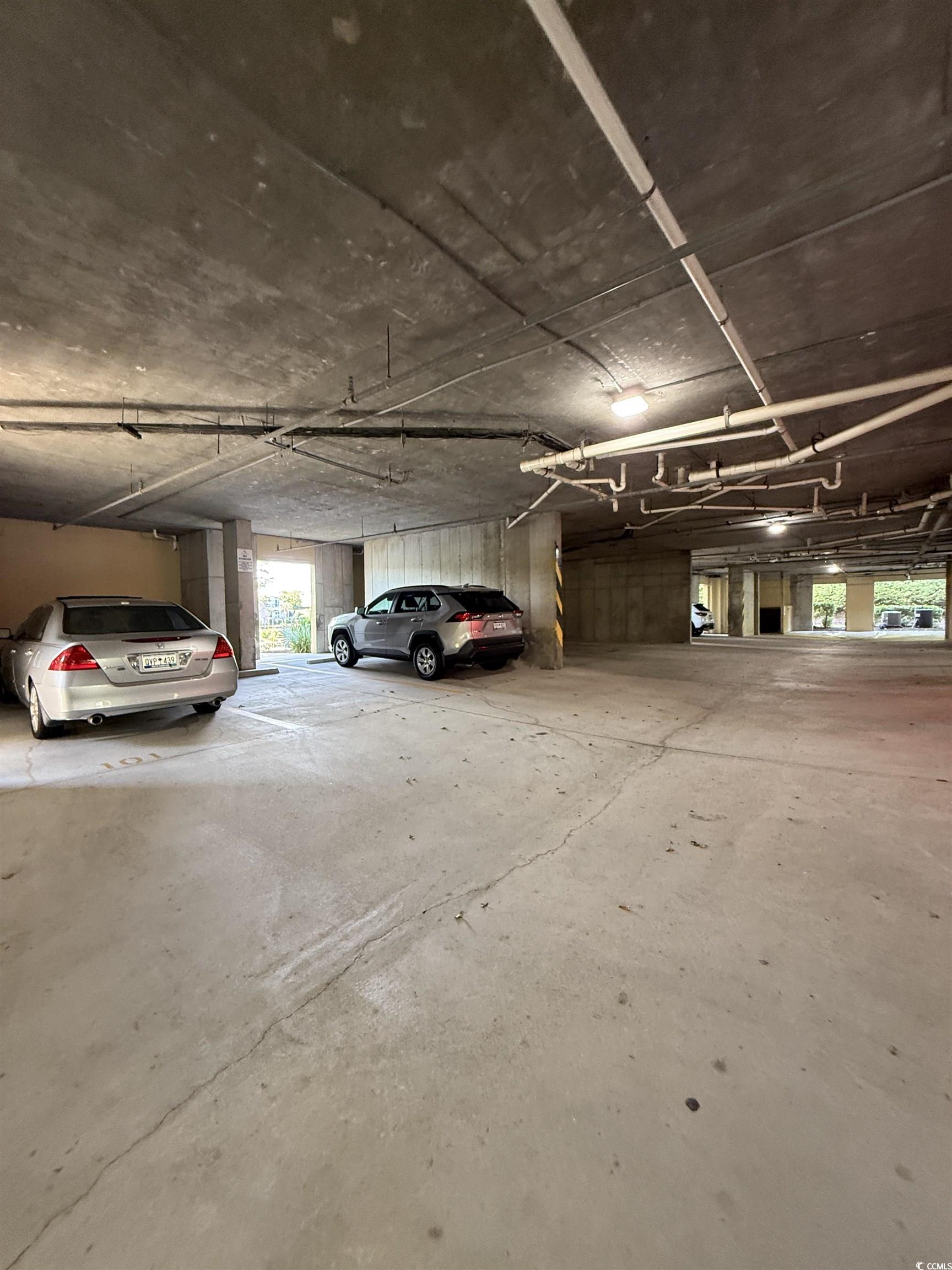 1330 Villa Marbella Court, Unit 303 Myrtle Beach, SC 29572 - Photo 39 of 40 View of parking garage below unit