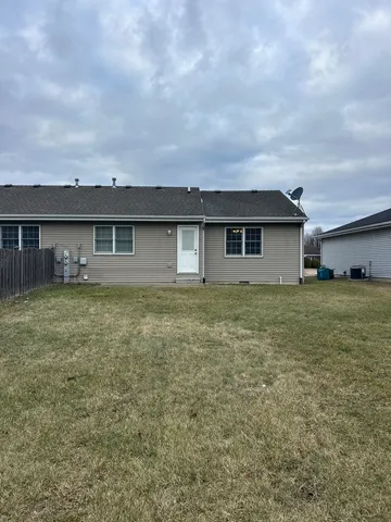 a front view of house with yard