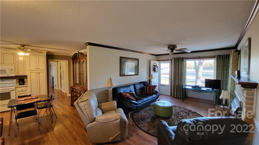 3518 Upper White Store Road Peachland, NC 28133 - Photo 14 of 33 a living room with furniture and a large window