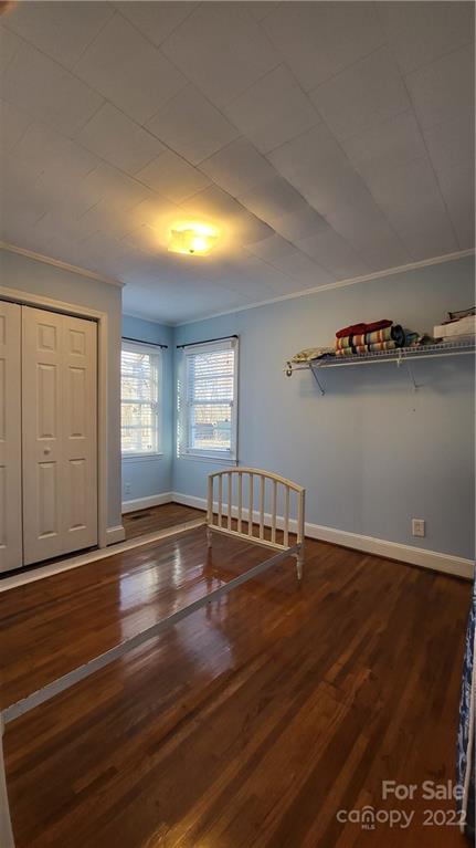 3518 Upper White Store Road Peachland, NC 28133 - Photo 31 of 33 a view of an empty room with window and wooden floor