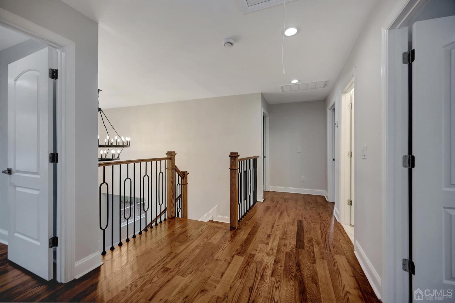 55 Walnut Street Edison, NJ 08817 - Photo 30 of 40 a view of hallway with wooden floor