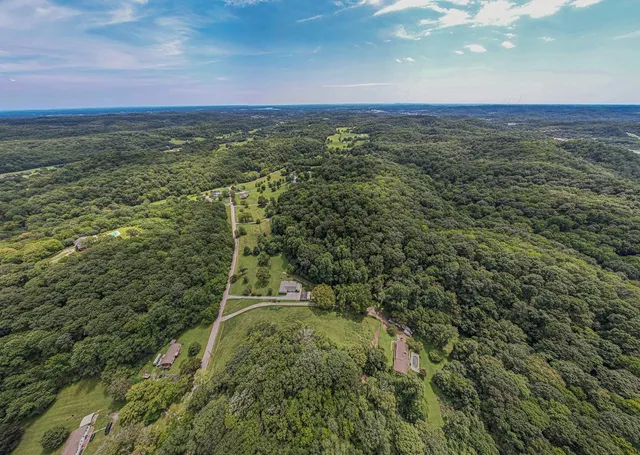 a view of a yard with an outdoor space