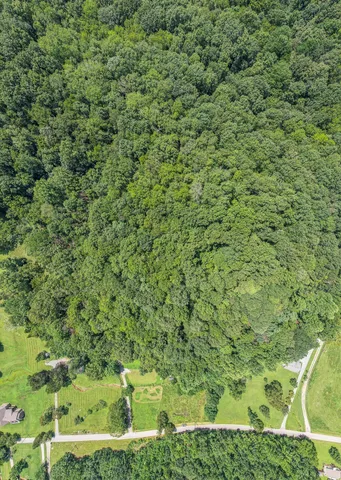 a view of a field with an outdoor space