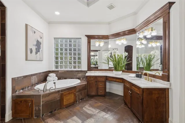a kitchen with a sink and large window