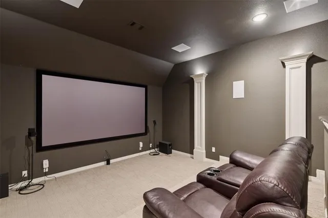 a projector room with furniture projector and screen