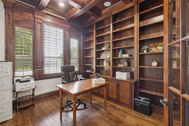 a workspace with furniture and wooden floor